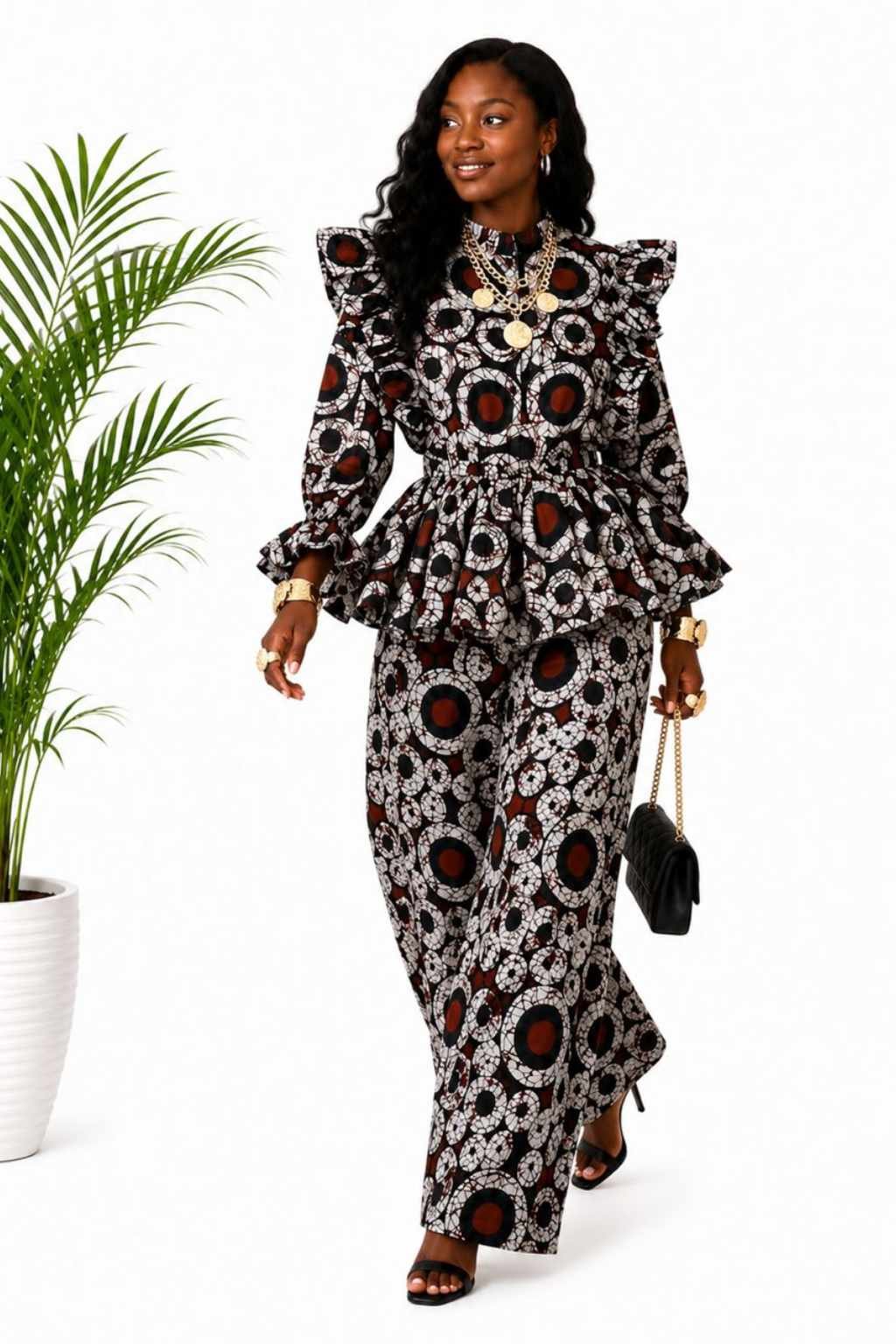 Brown Circle Batik African Print Peplum Top & Pants Set 2 Woman wearing a brown, black and cream circle batik African print peplum top and wide-leg pants set - view 2