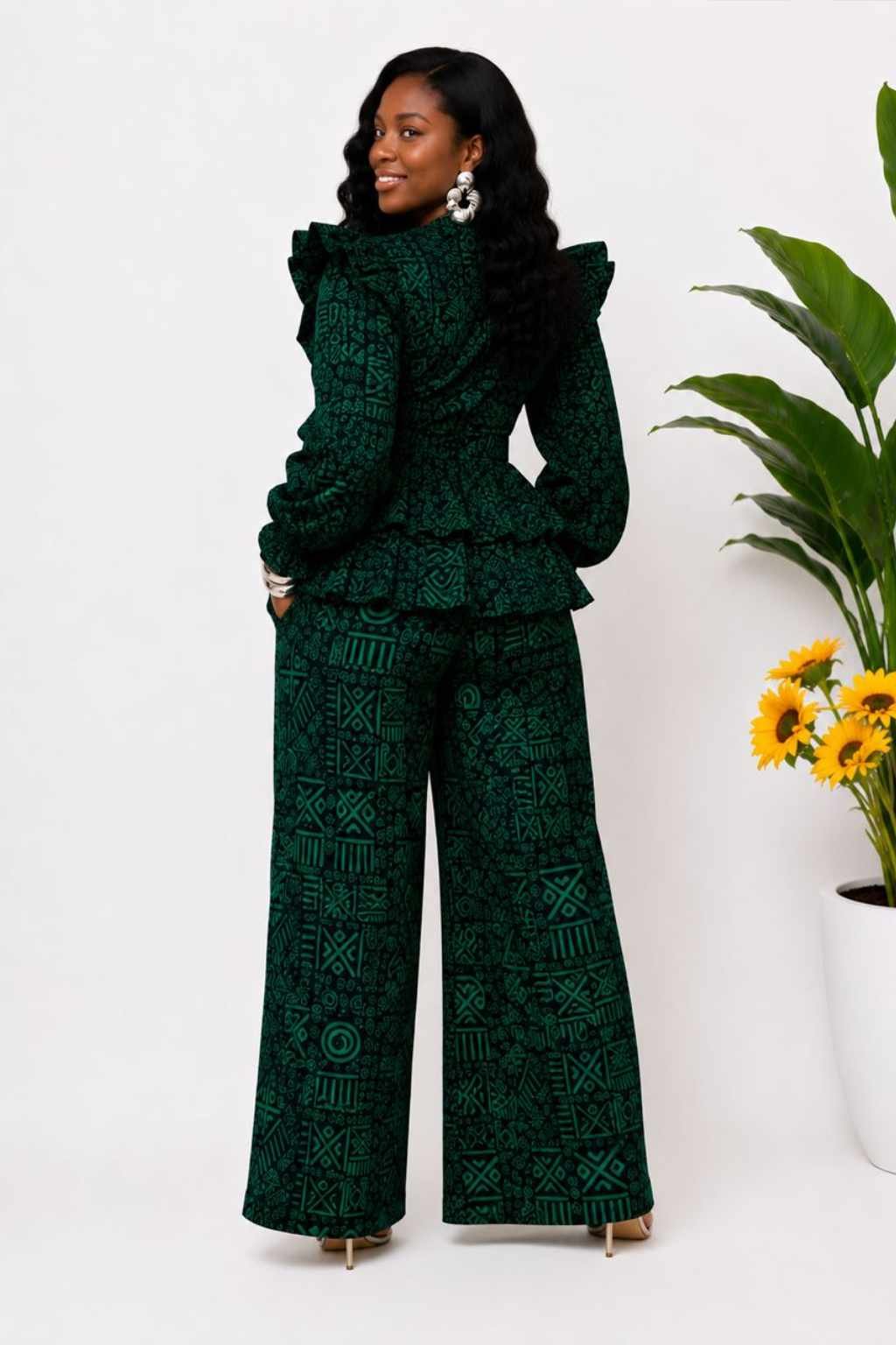 Green Tribal African Print Peplum Top & Pants Set 3 Woman wearing a deep green and black tribal African print peplum top and wide-leg pants set - view 3