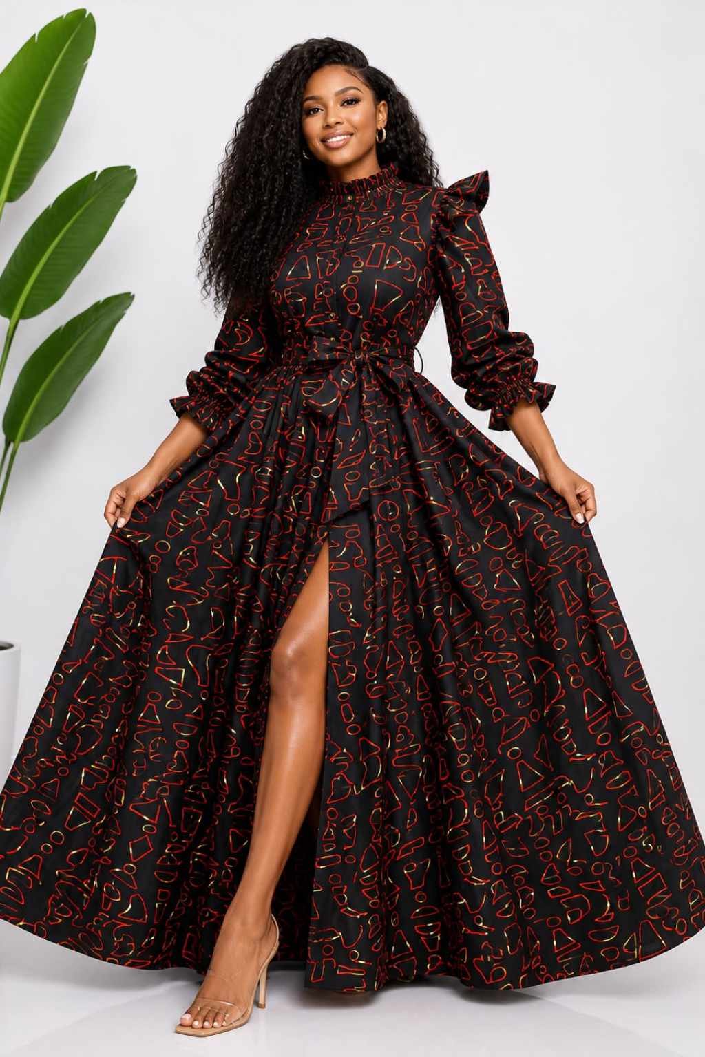 Black Red & Gold Abstract African Print Top & Skirt Set 3 Woman wearing a black, red and gold abstract African print two-piece top and maxi skirt set - view 3