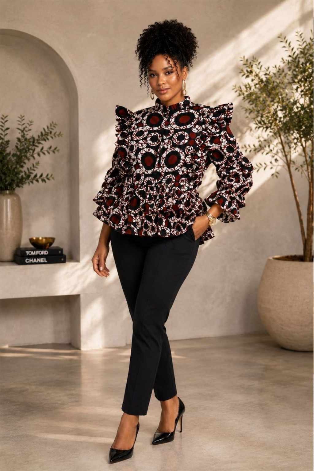 White Red & Black Circle Batik African Print Peplum Top 2 Woman wearing a white, red and black circle batik African print ruffle peplum top - view 2