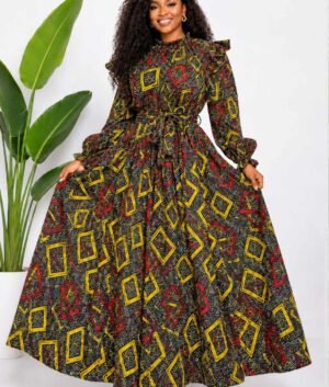 Woman wearing a black, gold and red geometric diamond African print two-piece top and maxi skirt set