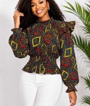 Woman wearing a black, red and yellow geometric African print ruffle peplum top