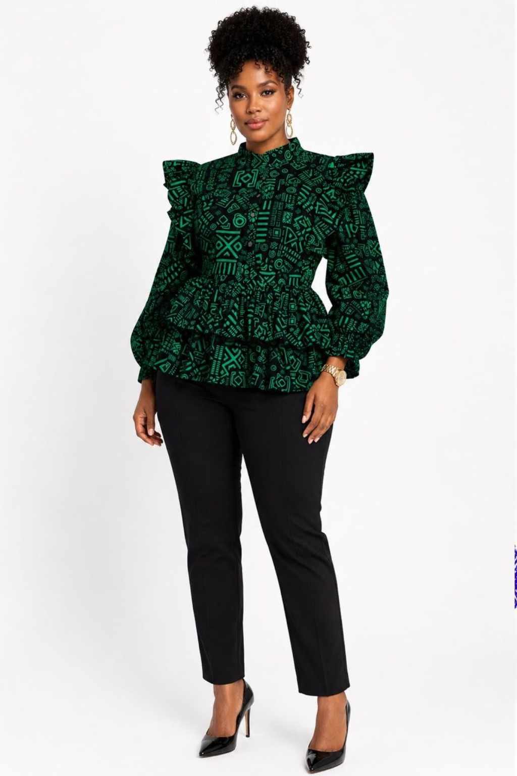 Woman wearing a green and black tribal African print ruffle peplum top