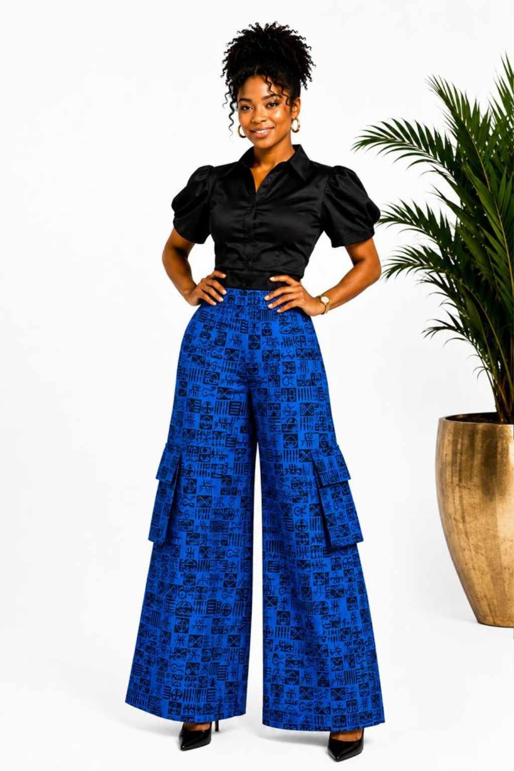 Woman wearing blue and black tribal African print cargo wide-leg palazzo pants