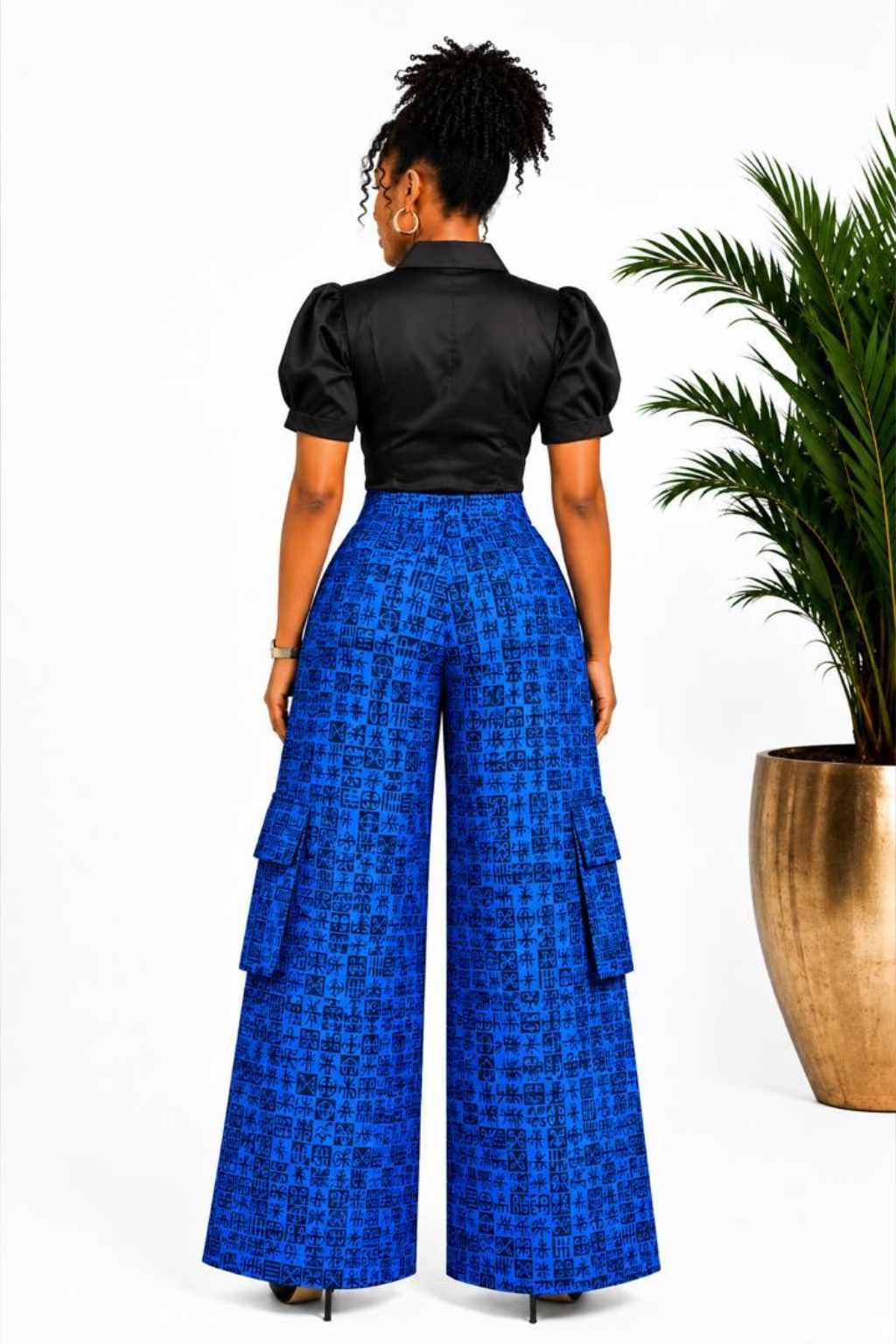 Blue Tribal African Print Cargo Palazzo Pants 2 Woman wearing blue and black tribal African print cargo wide-leg palazzo pants - view 2