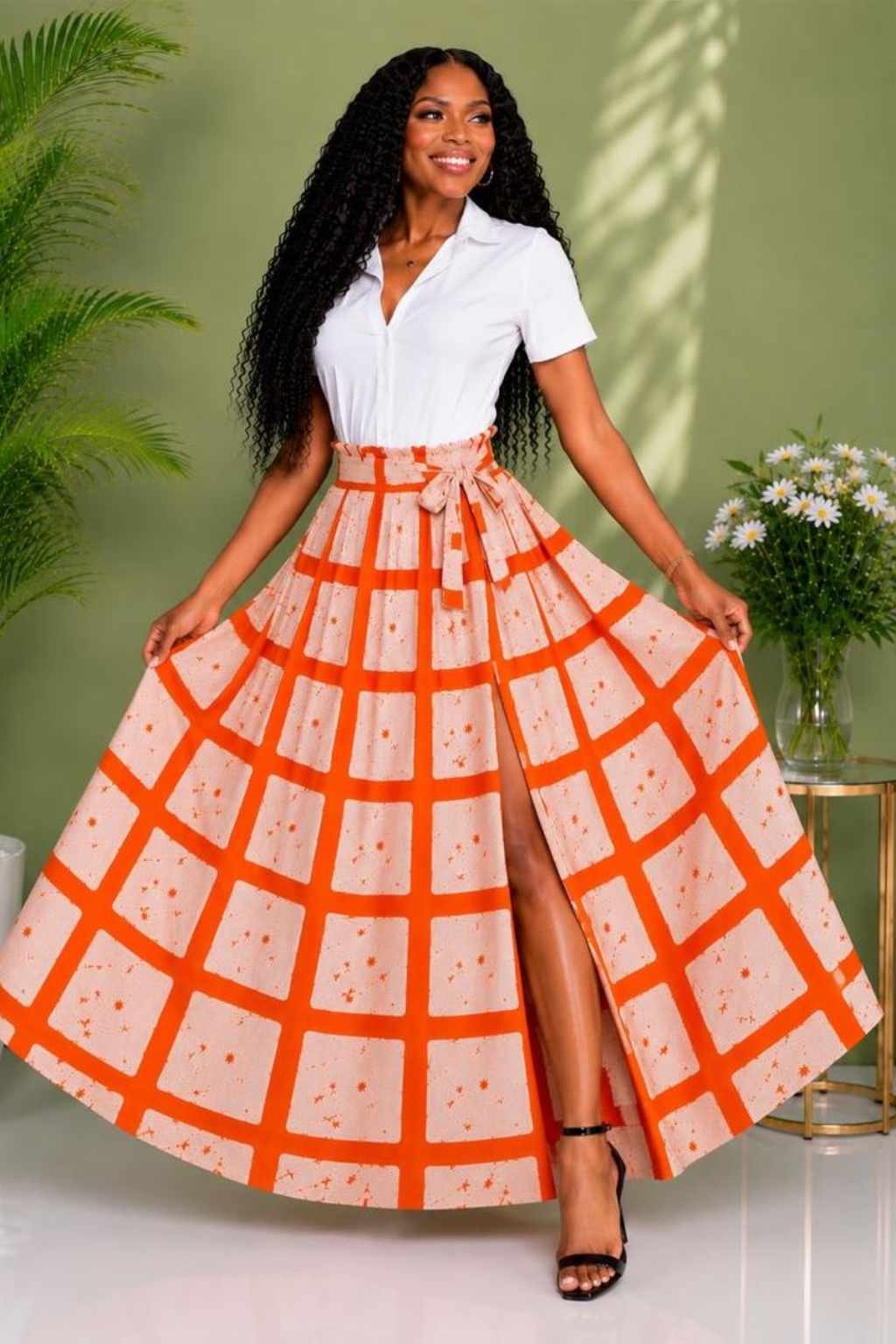Rust Orange Windowpane Check African Print Peplum Top 2 Woman wearing a rust orange and cream windowpane check African print ruffle peplum top - view 2