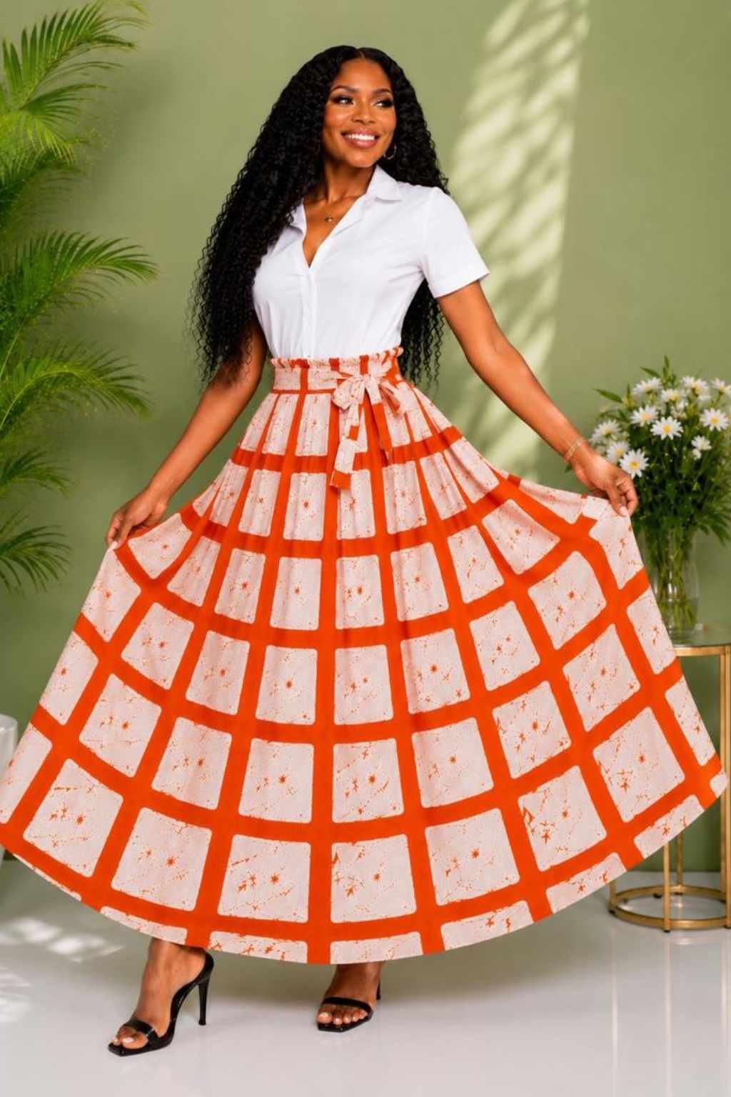 Rust Orange Windowpane Check African Print Peplum Top 3 Woman wearing a rust orange and cream windowpane check African print ruffle peplum top - view 3