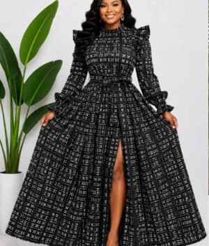 Woman wearing a black and white mudcloth bogolan African print two-piece top and maxi skirt set