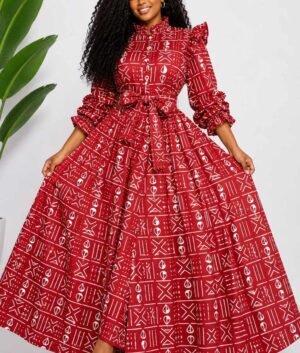 Woman wearing a red and white mudcloth bogolan African print two-piece top and maxi skirt set