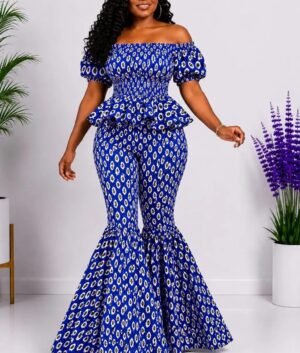 Woman wearing a blue floral African print off-shoulder top and flare-leg pants set - view 2