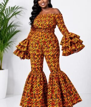 Woman wearing a kente African print off-shoulder bell-sleeve top and flare-leg pants set