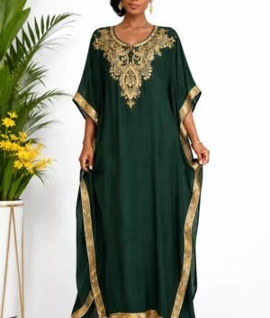 Woman wearing a emerald green gold-embellished kaftan maxi gown