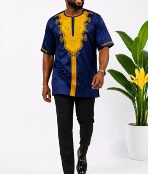Man wearing a purple embroidered African print short-sleeve shirt