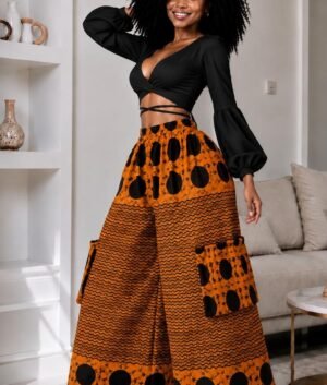 Woman Wearing A Wide-Leg Ankara Cargo Pants and Terracotta Orange and Black Polka Dot Palazzo Trousers only.