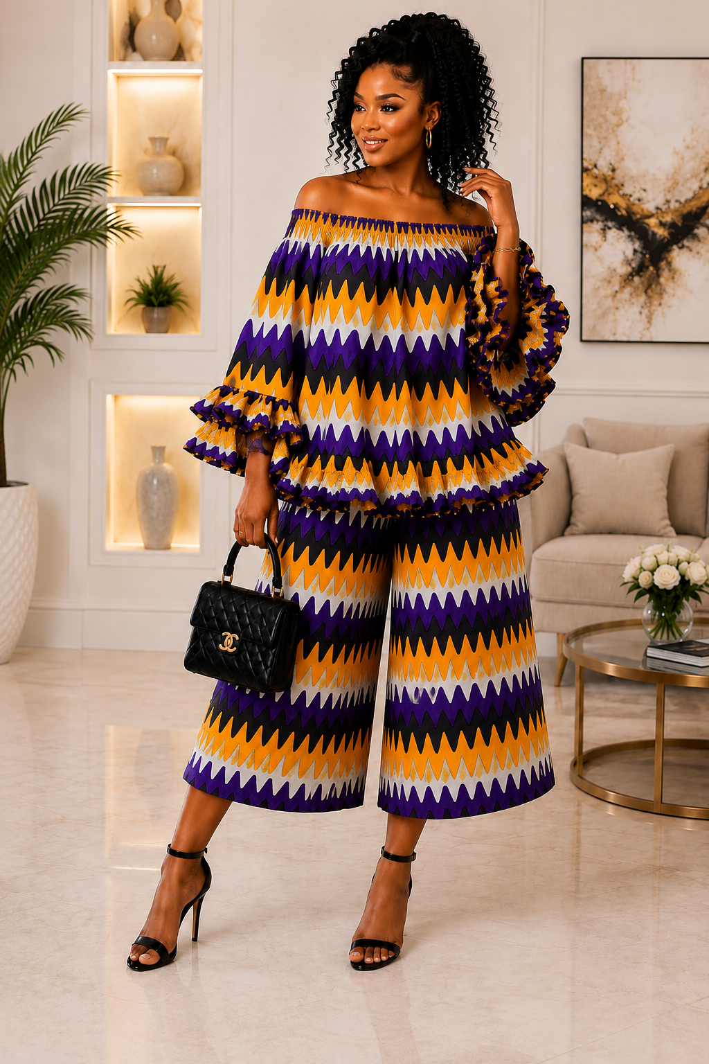 A Woman Wearing An African Print Pants Set, Ruffle Top Wide Leg Culottes And Purple Orange Co-Ord Boubou Set.