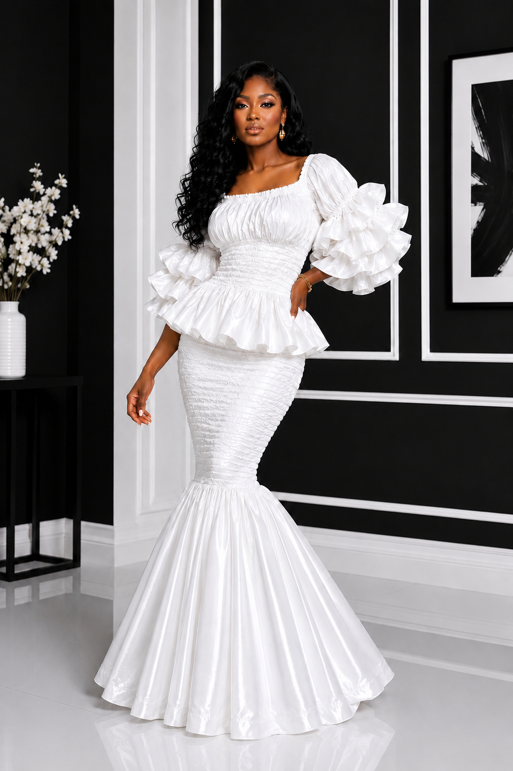 A Woman Wearing An Elastic Pearl White Smocked Peplum Top And Ruffle Mermaid Maxi Skirt Set.