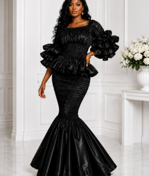 A Woman Wearing An Elastic Onyx Midnight Smocked Peplum Top & Ruffle Mermaid Maxi Skirt Set.
