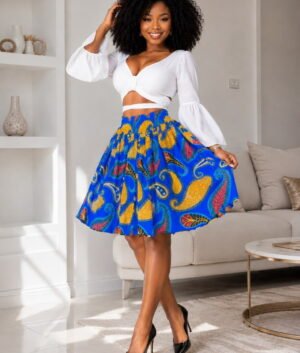 A Woman Wearing A Ankara Flare Mini Skirt – High-Waisted Royal Blue and Yellow Paisley African Print For Women and Summer Party Outfit.