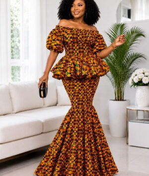 Woman Wearing A Zuri Smocked Kente Peplum Mermaid Set – Earth-Toned Geometric African Print Two-Piece Gown