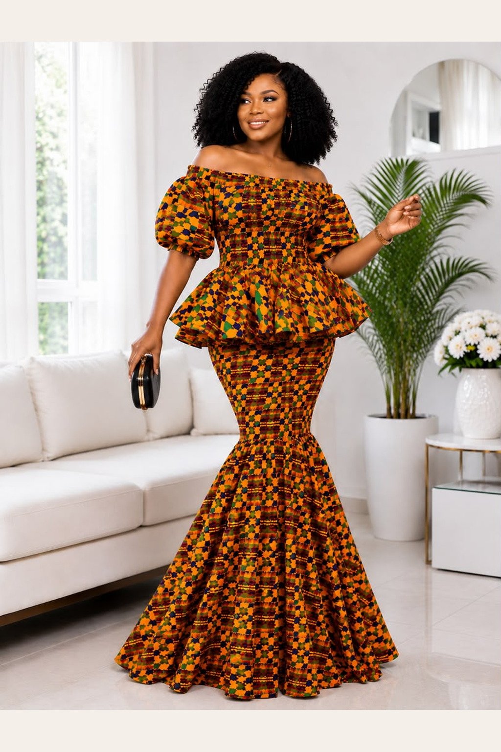 Woman Wearing A Zuri Smocked Kente Peplum Mermaid Set – Earth-Toned Geometric African Print Two-Piece Gown