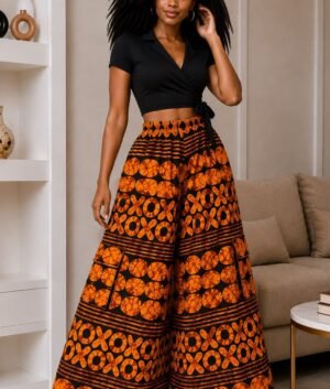 Woman Wearing A Terracotta Orange and Black Polka Dot Wide-Leg Ankara Cargo Pants and Palazzo Trousers Only.