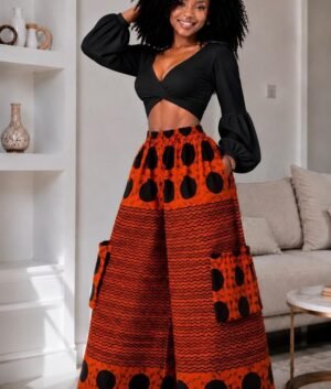 Woman Wearing A Wide-Leg Ankara Cargo Pants and Terracotta Orange and Black Polka Dot Palazzo Trousers only.