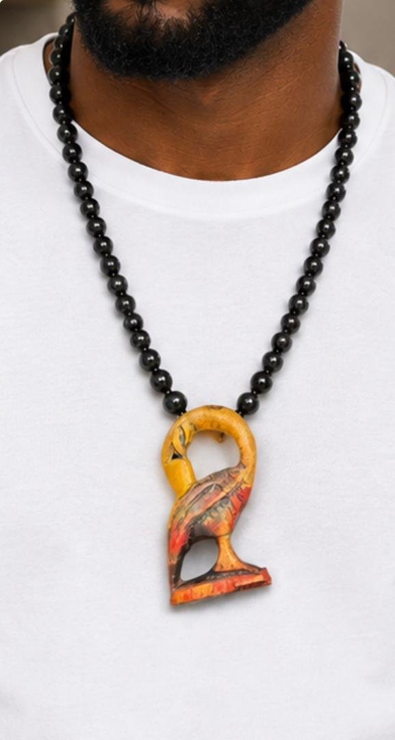 Hand Carved African Mask Necklace, Wooden Statement Pendant, Black Beaded Tribal Choker, Men Unisex Cowrie Shell Jewelry And Authentic Artisan Gift. 2 Man Wearing A Hand Carved African Mask Necklace, Wooden Statement Pendant, Black Beaded Tribal Choker, Men Unisex Cowrie Shell Jewelry And Authentic Artisan Gift.
