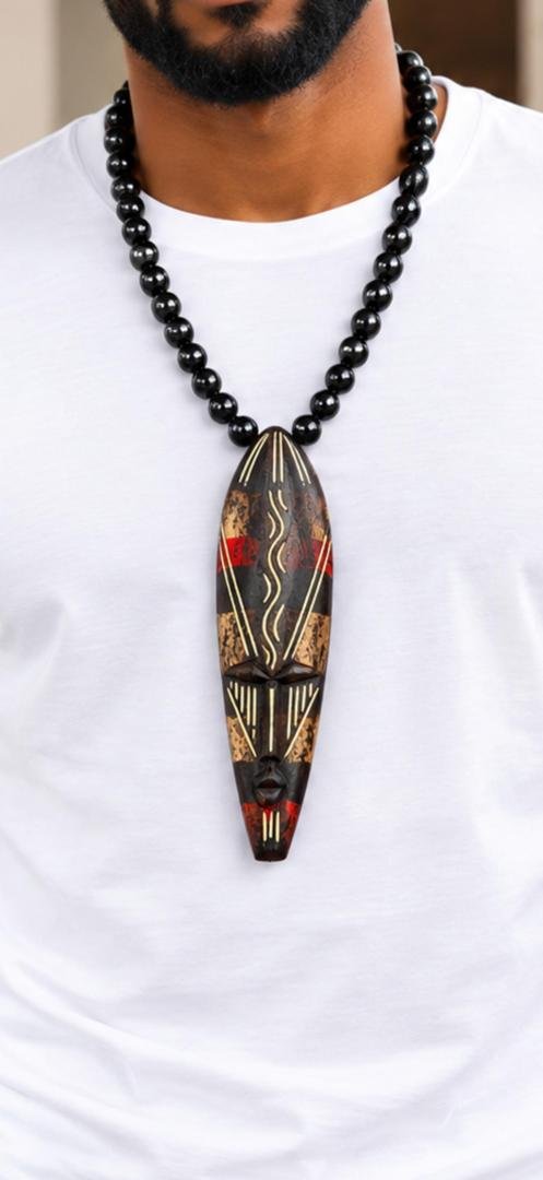 Hand Carved African Mask Necklace, Wooden Statement Pendant, Black Beaded Tribal Choker, Men Unisex Cowrie Shell Jewelry And Authentic Artisan Gift. 3 Man Wearing A Hand Carved African Mask Necklace, Wooden Statement Pendant, Black Beaded Tribal Choker, Men Unisex Cowrie Shell Jewelry And Authentic Artisan Gift.