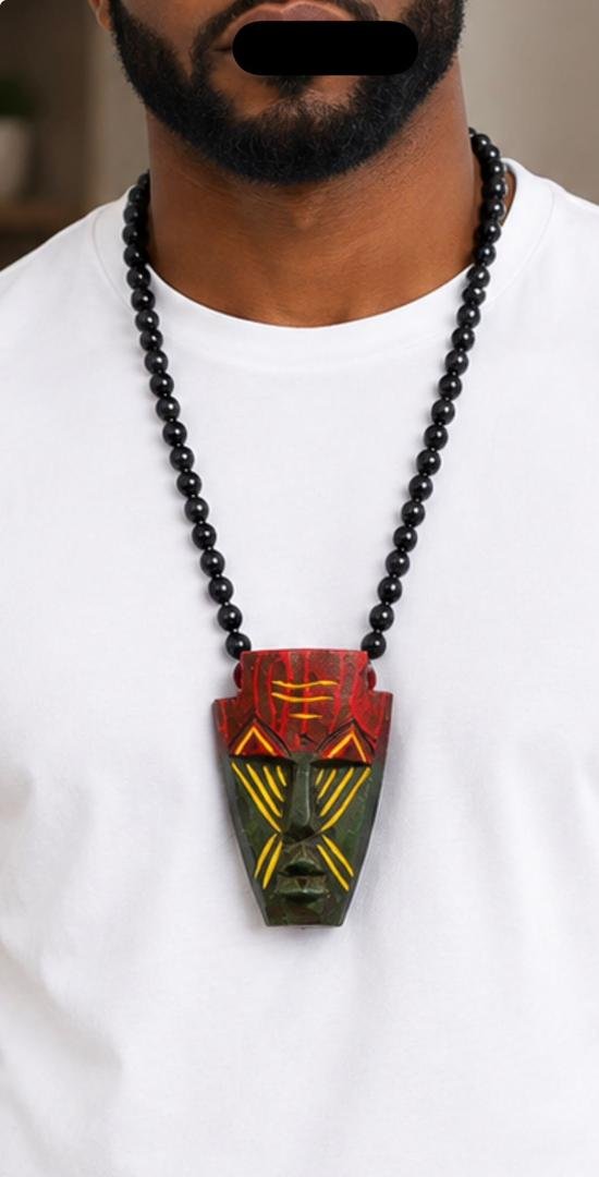 Hand Carved African Mask Necklace, Wooden Statement Pendant, Black Beaded Tribal Choker, Men Unisex Cowrie Shell Jewelry And Authentic Artisan Gift. 8 Man Wearing A Hand Carved African Mask Necklace, Wooden Statement Pendant, Black Beaded Tribal Choker, Men Unisex Cowrie Shell Jewelry And Authentic Artisan Gift.