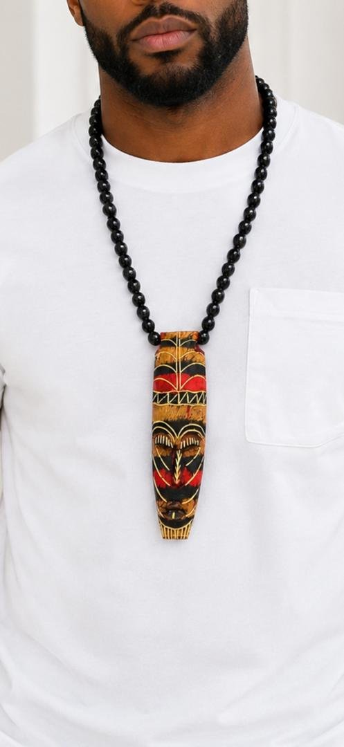 Hand Carved African Mask Necklace, Wooden Statement Pendant, Black Beaded Tribal Choker, Men Unisex Cowrie Shell Jewelry And Authentic Artisan Gift. 11 Man Wearing A Hand Carved African Mask Necklace, Wooden Statement Pendant, Black Beaded Tribal Choker, Men Unisex Cowrie Shell Jewelry And Authentic Artisan Gift.