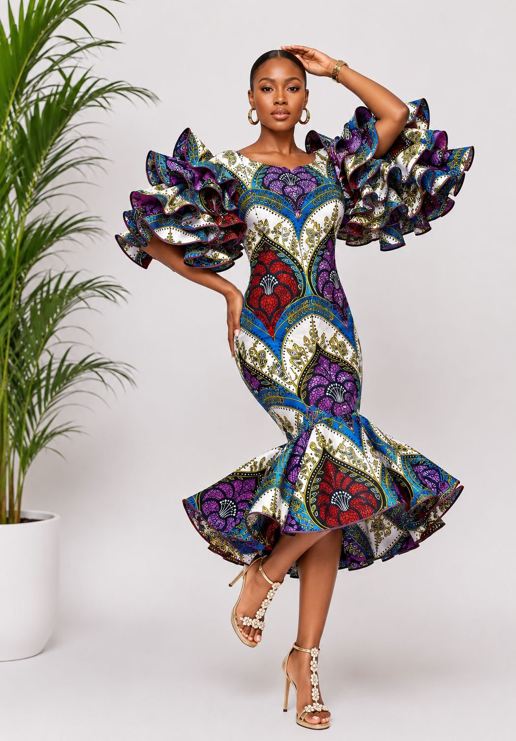 Imperial Tapestry Ankara Multi-Tiered Ruffle Mermaid Dress. 3 A Woman Wearing An Imperial Tapestry Ankara Multi-Tiered Ruffle Mermaid Dress.