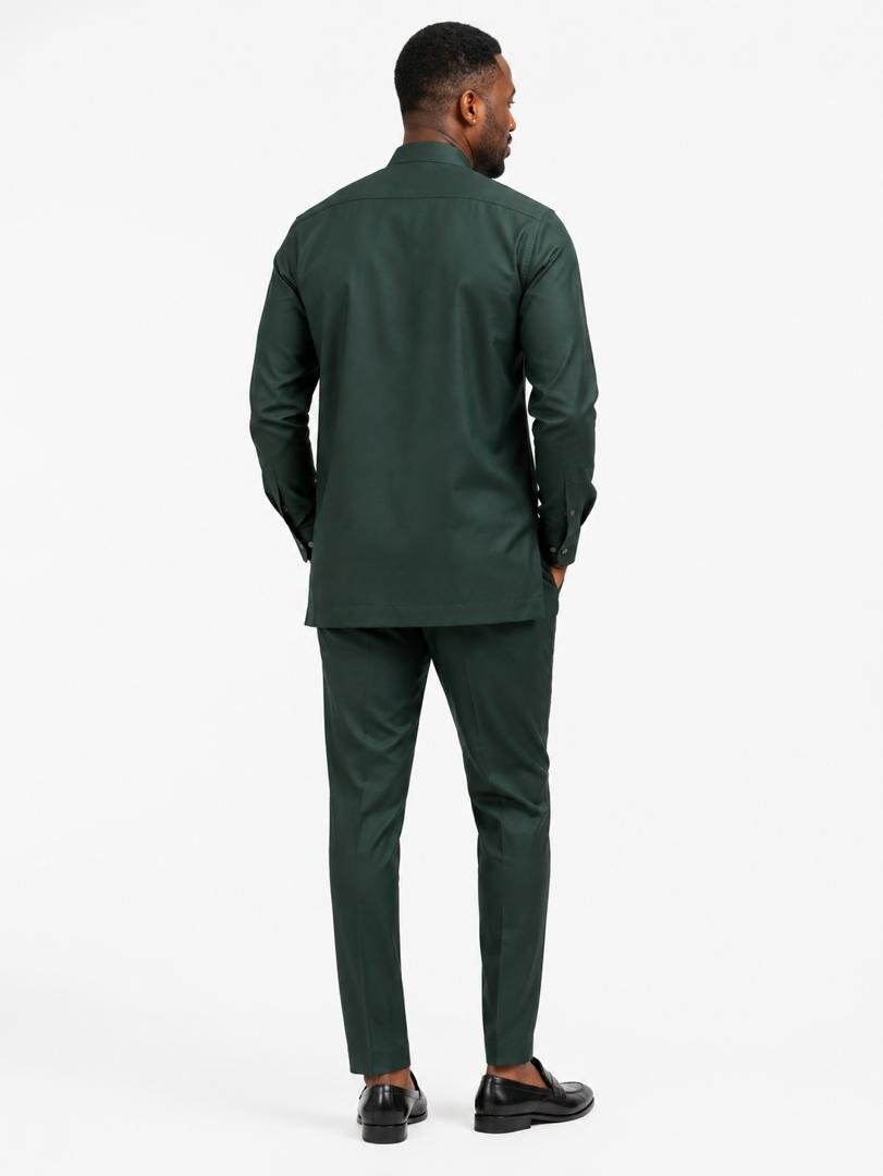 Men All‑Emerald Green African‑Inspired Long Sleeve Set, Modern Kaftan Shirt & Slim Pants. 3 Man Wearing All‑Emerald Green African‑Inspired Long Sleeve Set, Modern Kaftan Shirt & Slim Pants.