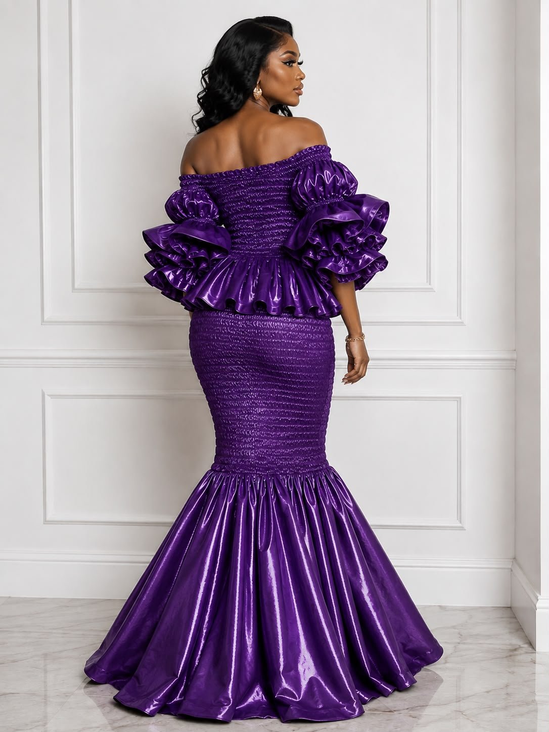 Khadija Metallic Smocked Mermaid Dress – Royal Purple Satin Two-Piece Gown with Dramatic Tiered Ruffles. 2 Woman Wearing A Khadija Metallic Smocked Mermaid Dress – Royal Purple Satin Two-Piece Gown with Dramatic Tiered Ruffles