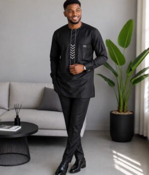 Man Wearing A Black Luxury Embroidered Long Sleeve Agbada Top & Trousers (Set), Kaftan Suit And African Senator Outfit.