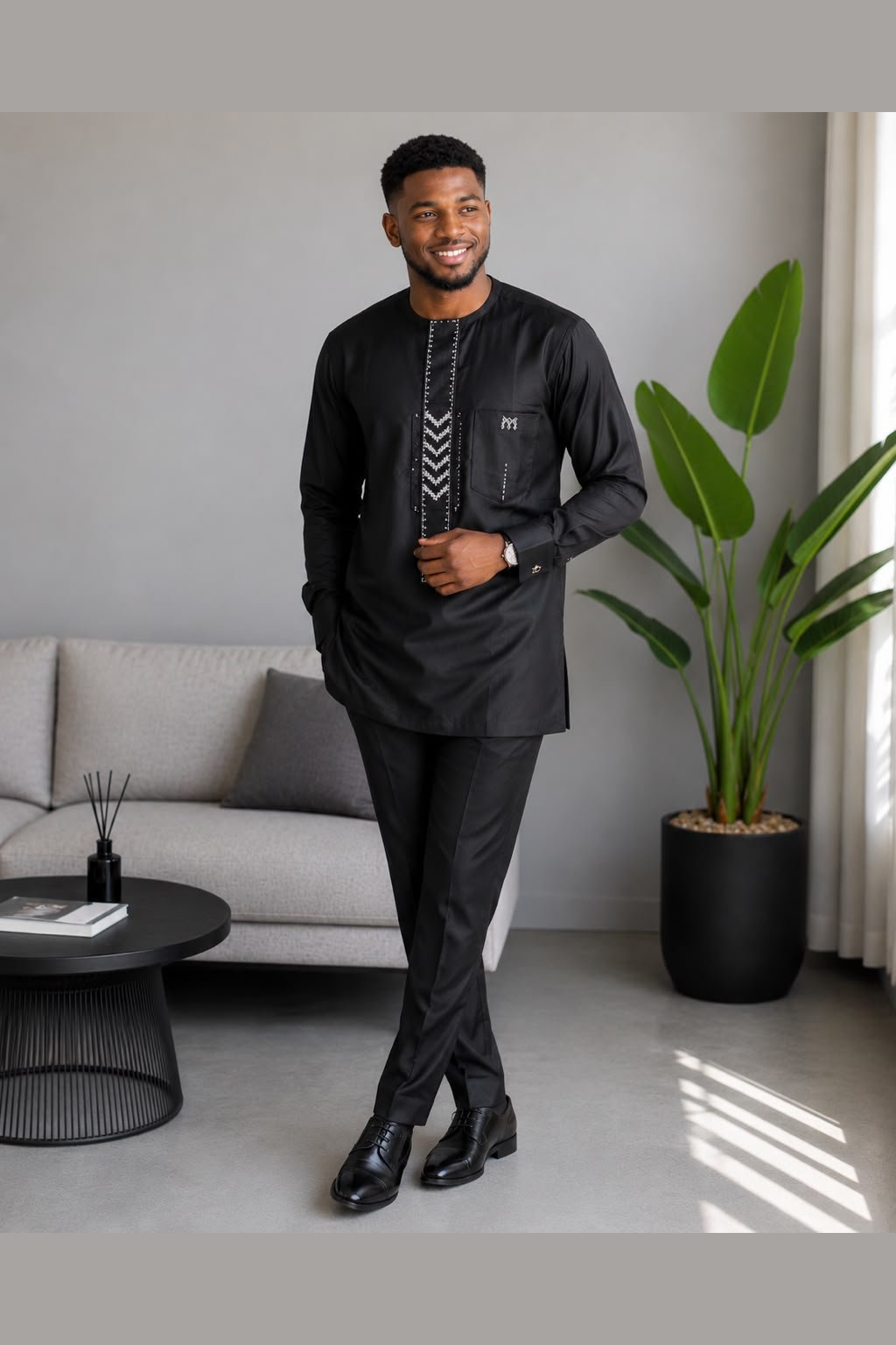 Man Wearing A Black Luxury Embroidered Long Sleeve Agbada Top & Trousers (Set), Kaftan Suit And African Senator Outfit.
