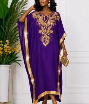 A Woman Wearing A Luxury Royal Purple And Gold Embroidery Kaftan Dress and Boubou Gown.