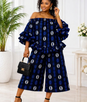 Woman Wearing A Royal Blue & Onyx African Print Two-Piece Set, Off-Shoulder Ruffle Top & Wide-Leg Pants , Stylish Ankara Outfit for Women.