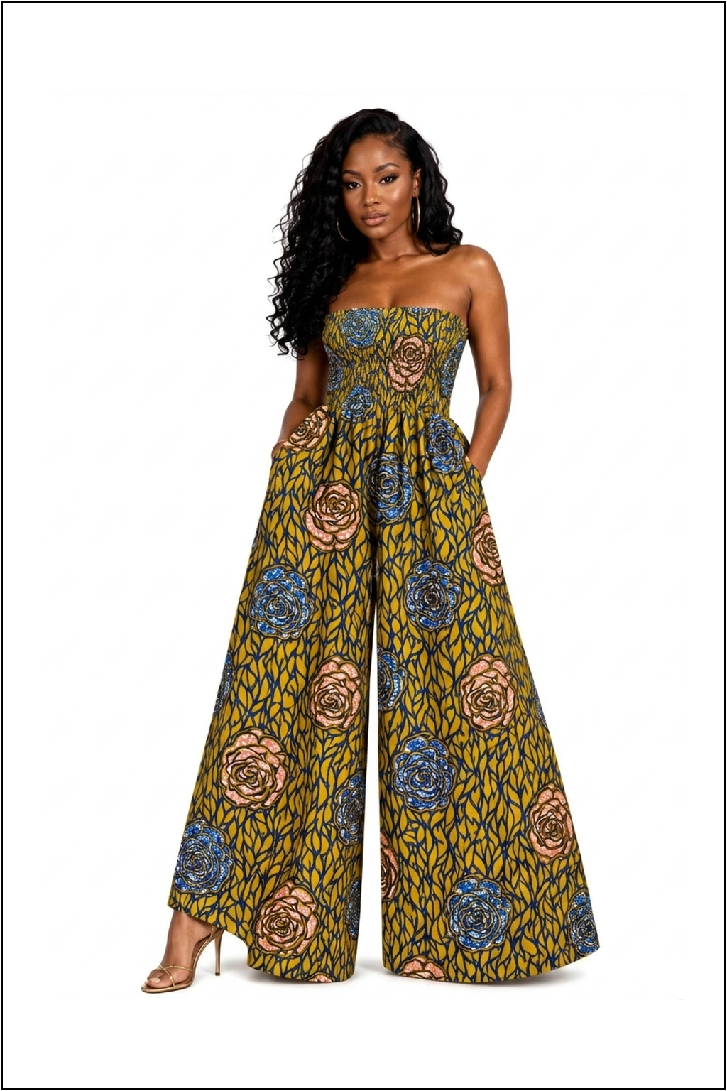Women Wearing An African Print Yellow & Blue Strapless Wide‑Leg Jumpsuit with Pockets, Floral Palazzo Romper And Bold Ankara Floral Statement Outfit.