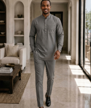 Man Wearing All-Grey African‑Inspired Long Sleeve Set, Modern Kaftan Shirt & Slim Pants.