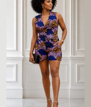 Woman Wearing An African Print Sleeveless Romper, Bold Ankara Short Jumpsuit, Elegant Summer Outfit for Parties, Brunch & Everyday Style.