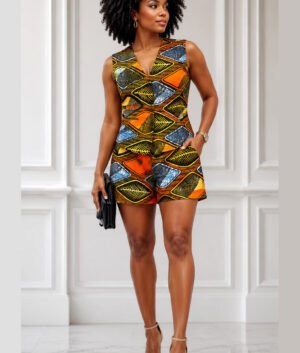 Woman Wearing An African Print Sleeveless Romper, Bold Ankara Short Jumpsuit, Elegant Summer Outfit for Parties, Brunch & Everyday Style.