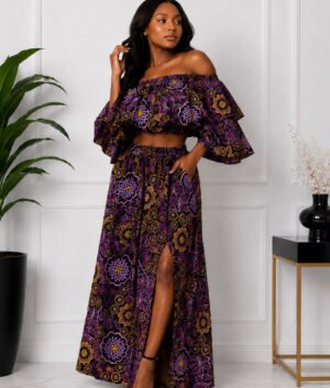 Woman Wearing An African Print Off‑Shoulder Two‑Piece Set, Purple Ankara Crop Top & Maxi Skirt.