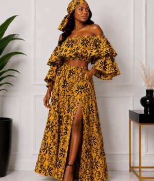Woman Wearing A Luxury Ankara Print 3-Piece Maxi Set – Tiered Off-the-Shoulder Crop Top, High-Slit Skirt & Matching Headwrap.