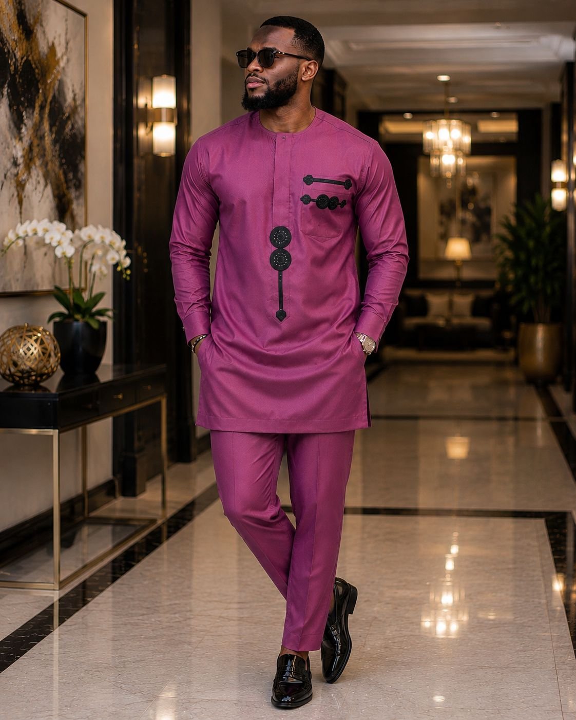 Mauve Purple & Charcoal Geometric Accent Senator Tunic And Tailored Pants Set. 2 A Man Wearing A Mauve Purple & Charcoal Geometric Accent Senator Tunic And Tailored Pants Set.