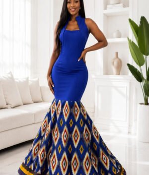 A Woman Wearing A Royal Blue And Ankara Geometric Diamond Accent Mermaid Gown.