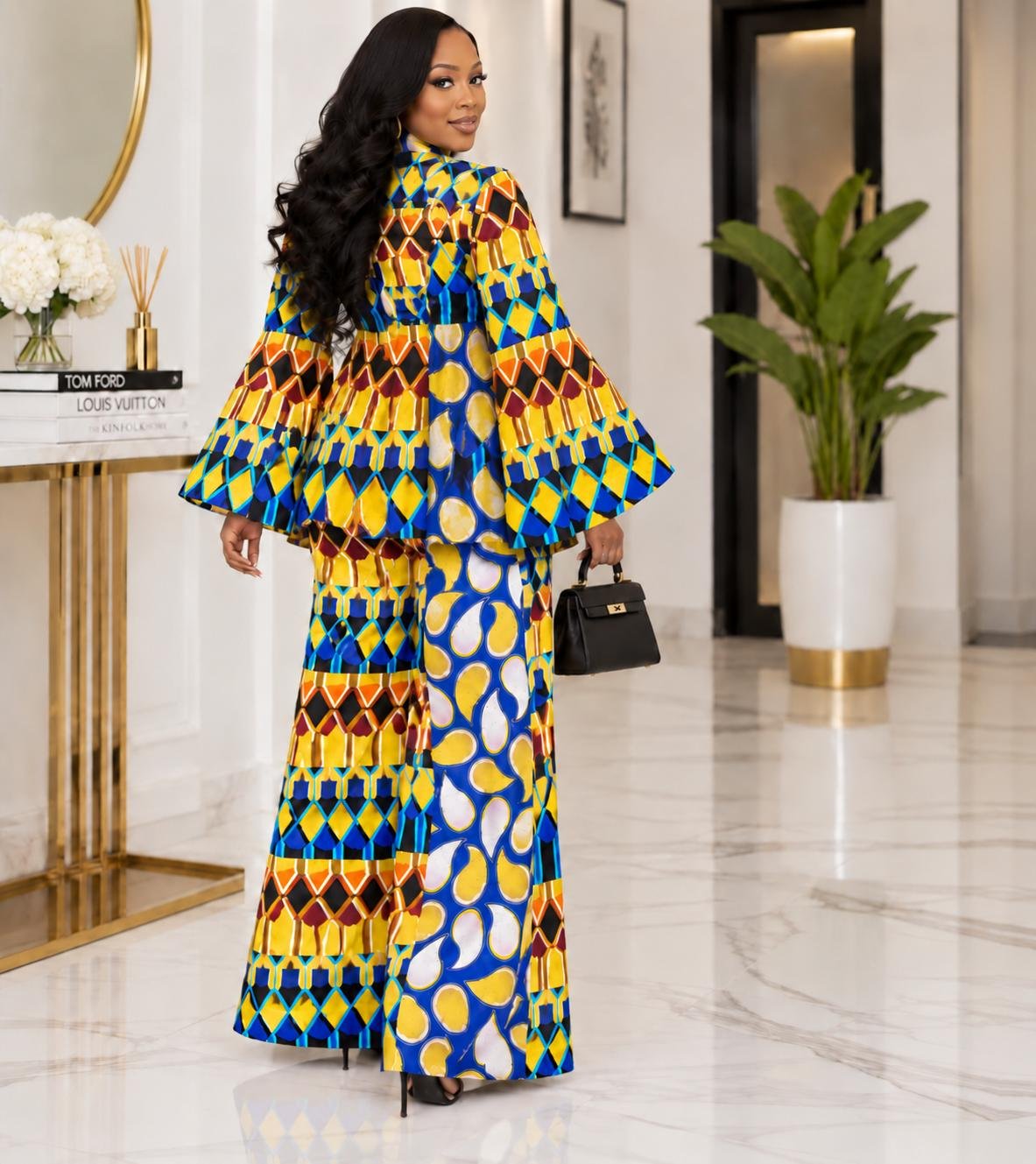 Cobalt & Marigold Multi-Pattern Asymmetric Peplum Blazer And Wide-Leg Pants Set. 3 A Woman Wearing A Cobalt & Marigold Multi-Pattern Asymmetric Peplum Blazer And Wide-Leg Pants Set.