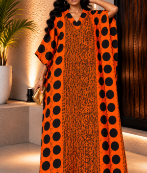 A Woman Wearing A Burnt Orange African Kaftan Dress, Polka Dot Boubou Gown And Silk Ankara Bubu Maxi.