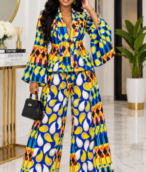 A Woman Wearing A Cobalt & Marigold Multi-Pattern Asymmetric Peplum Blazer And Wide-Leg Pants Set.