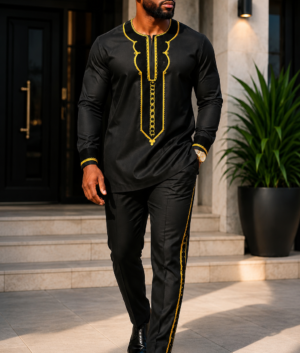 A Man Wearing An Obsidian Black & Gold Geometric Embroidered Senator Tunic And Tailored Pants Set.