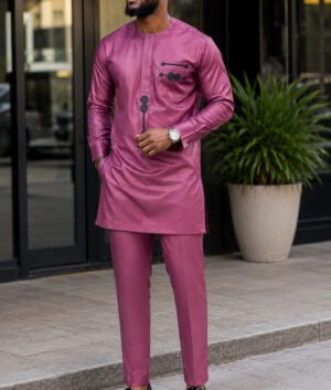 A Man Wearing A Mauve Purple & Charcoal Geometric Accent Senator Tunic And Tailored Pants Set.